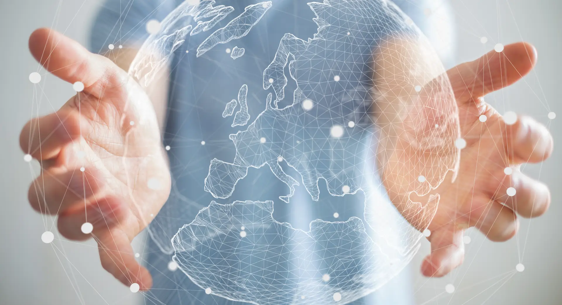 Businessman holding digital global network concept