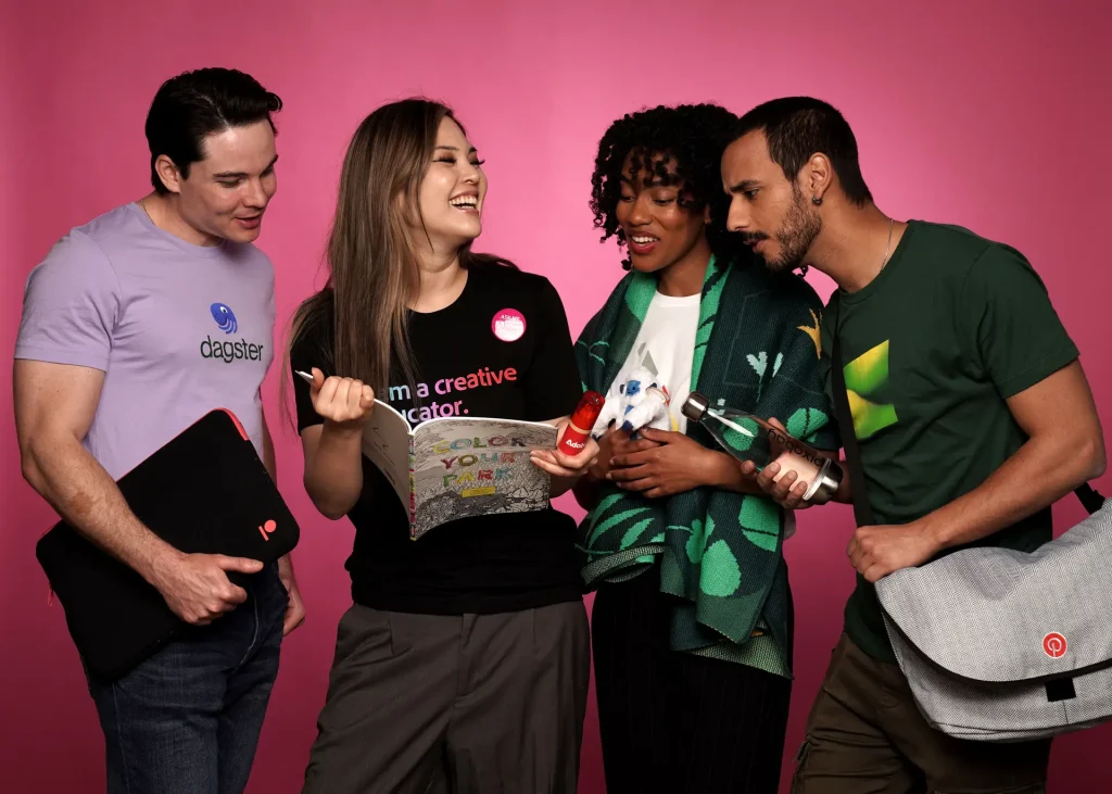Group discussing creative ideas with branded items