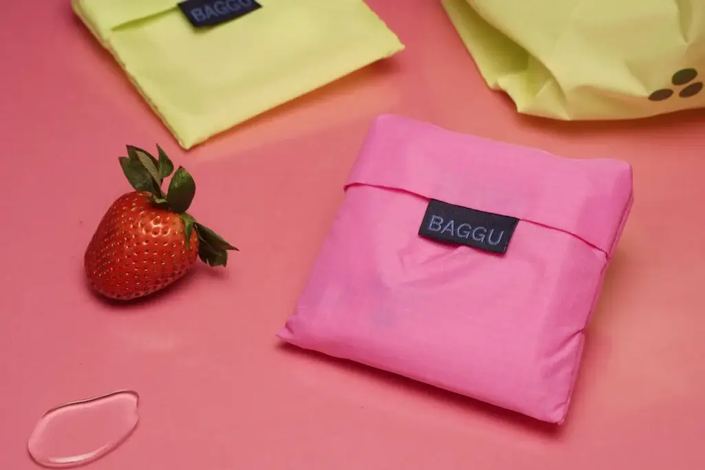 Pink and yellow reusable bags with strawberry