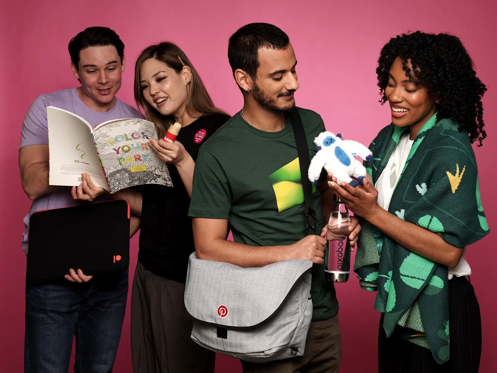 Group displaying custom branded plush toy and water bottle