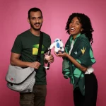 Happy pair with plush toy and branded items