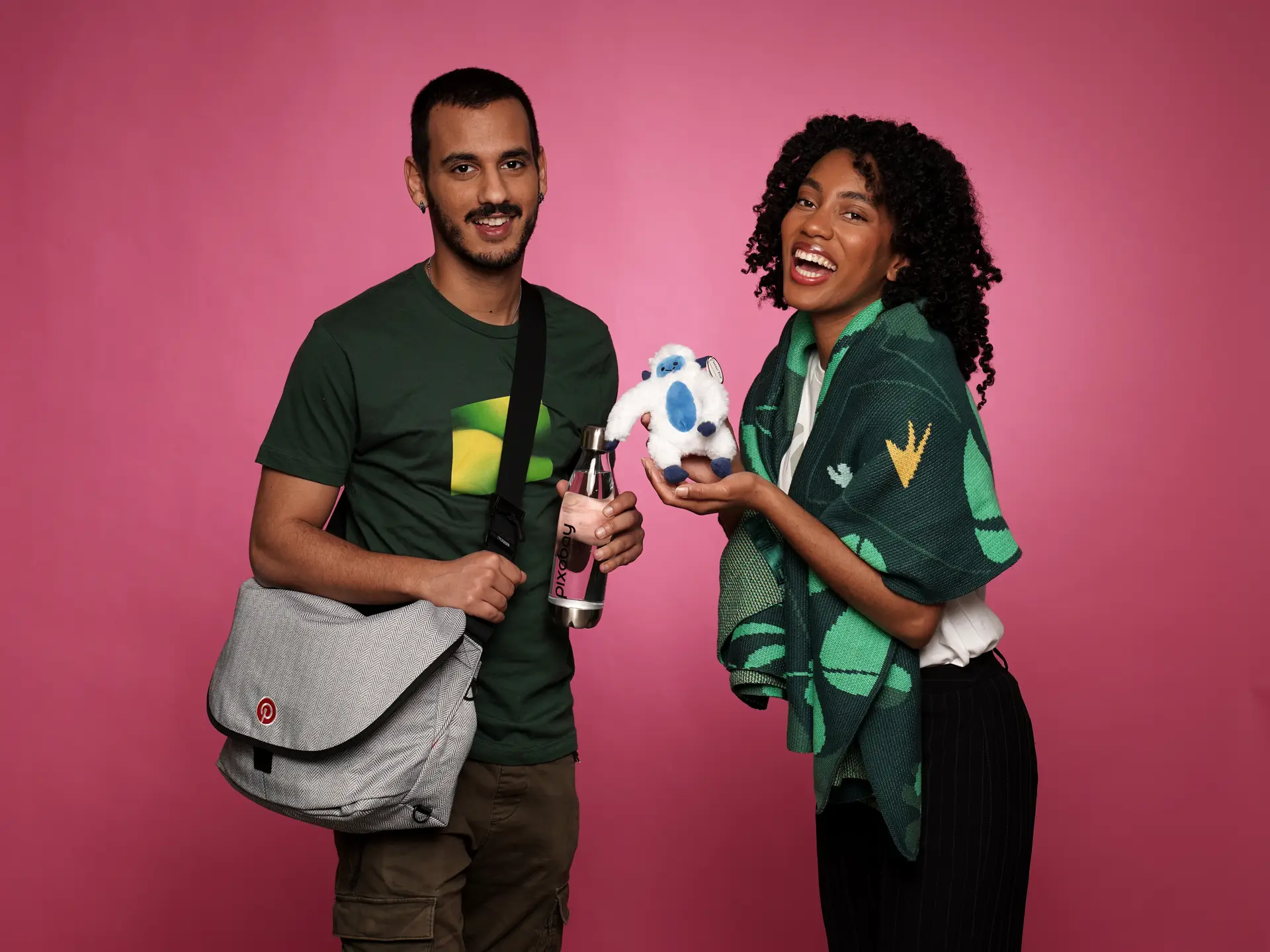 Happy pair with plush toy and branded items