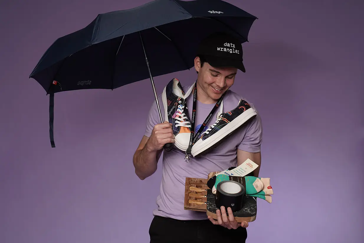 Man with umbrella and custom branded merchandise