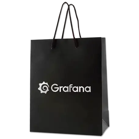 Premium black paper gift bag with Grafana logo, used for corporate swag kits and branded merchandise packaging