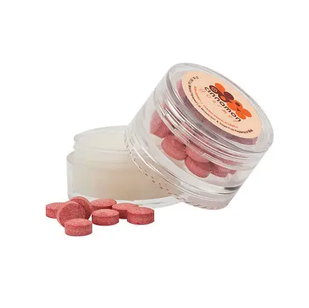 Clear plastic promotional pill container with custom branded label and red tablets, ideal giveaway item for corporate events and employee swag boxes.