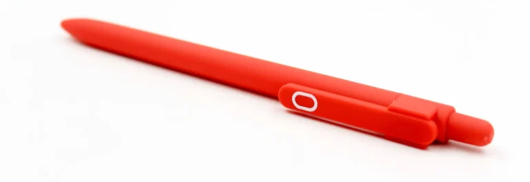 Red custom promotional pen with clip, ideal for corporate swag, event giveaways, and branded merchandise.