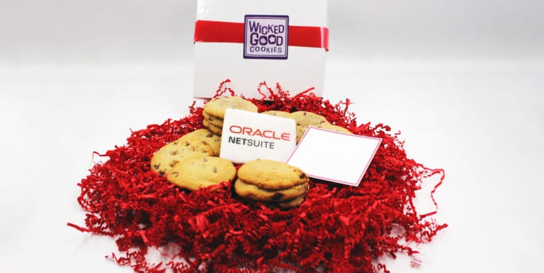 Custom corporate gift box with branded Oracle NetSuite cookie and Wicked Good Cookies packaging, ideal for employee recognition and promotional giveaways.